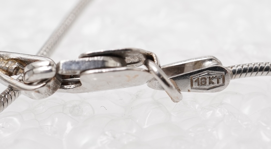 An aquamarine and diamond pendant